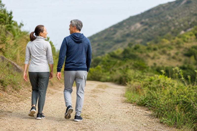 Couple Walking Trail in Proper Attire