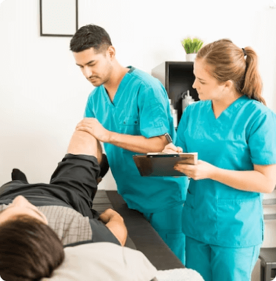 Focused shockwave therapy device being used to treat a chronic tendinopathy at CK Physiotherapy clinic in West London